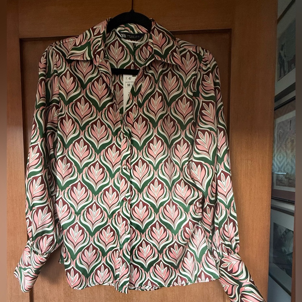 Zara long-sleeve shirt in a vibrant green and pink abstract or geometric print.